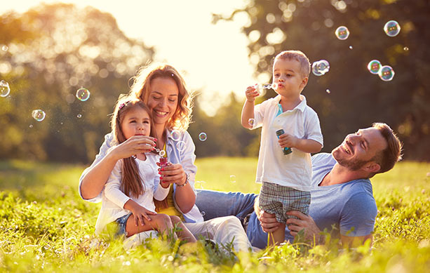 family outdoors in a field